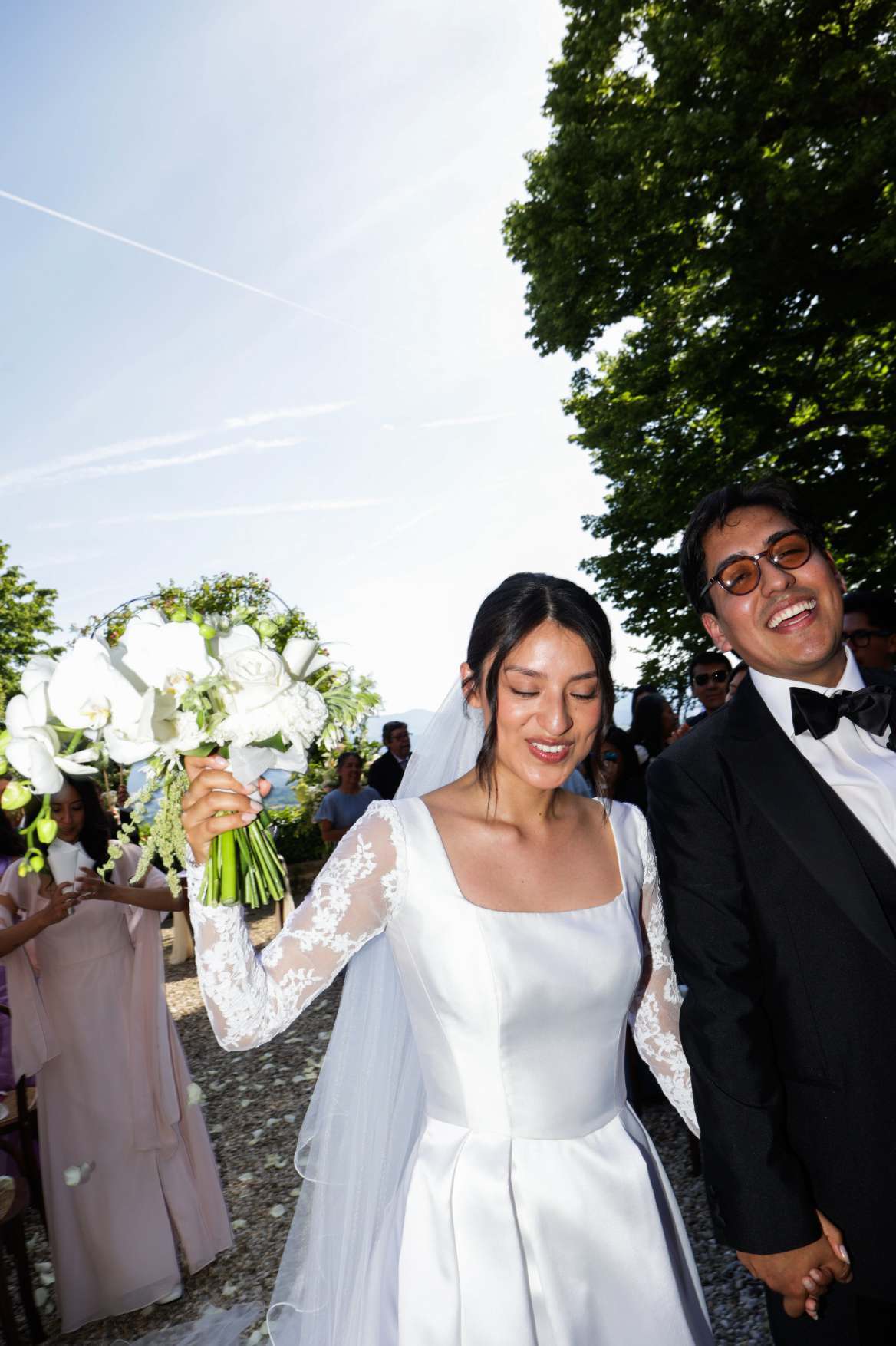 Newlywed couple leaving their ceremony